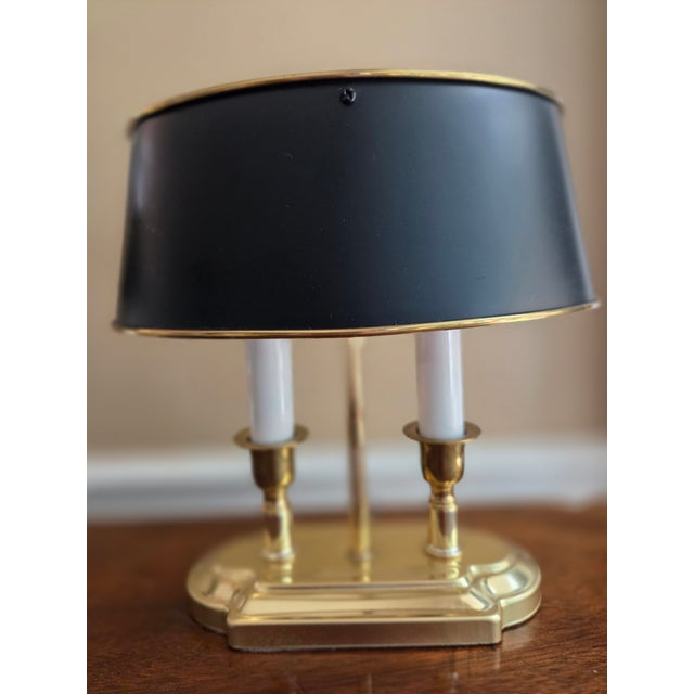 Lovely small bedside or desk lamp in the classic French bouillotte style with two candles and an brass finish. Includes...