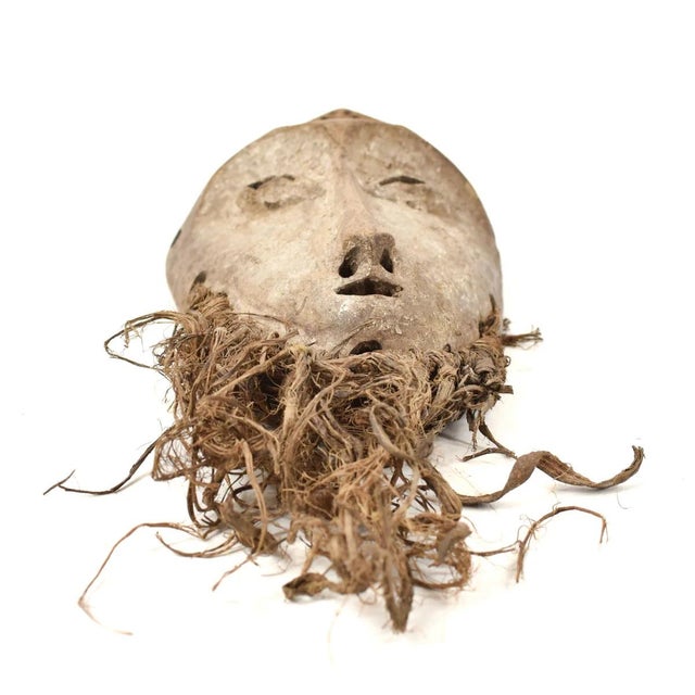 The Lega bearded mask originated from the Lualaba River near Lake Tanganyika in the Democratic Republic of the Congo. Lega...