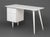Paul McCobb Style White Painted Wood Desk, the two drawers with gilt porcelain pulls above tapered flaring legs. 29.25" H...