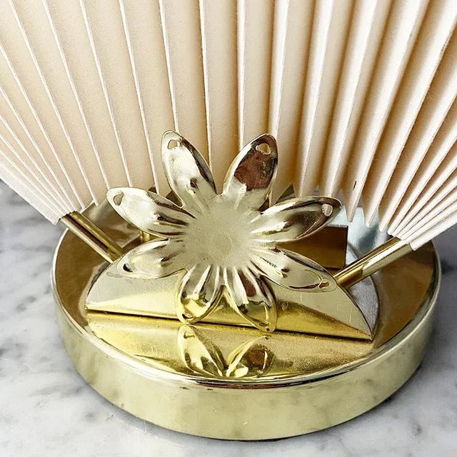 Abstract, Mid-Century Modern, or Hollywood Regency style cream or off white accordion fan table lamp with gold floral...