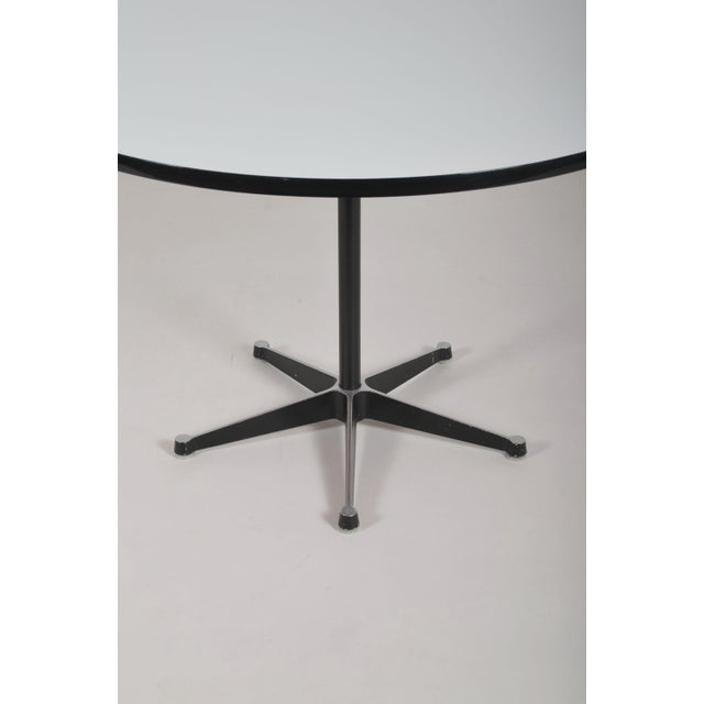 Vintage dining table model 650 designed in 1956 by Charles & Ray Eames . It had a very distinctive design with its...