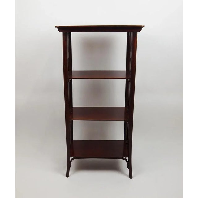 Shelf Escape in cockered in mahogany bent at four levels. Secession style of secession in beech cut on the sides. Carries...