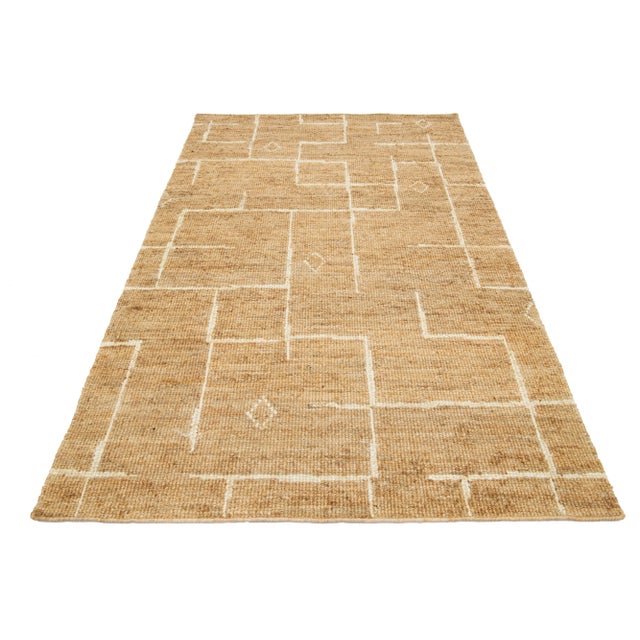 Modern Soumak Natural Jute and Cotton Rug. This rug measures 5' x 7'10". Custom sizes are made-to-order. Material: 80%...