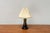 A traditional table lamp by the Danish manufacturer Holmegaard, designed by Hsin-Lung Lin in the late 1970s. A classic...