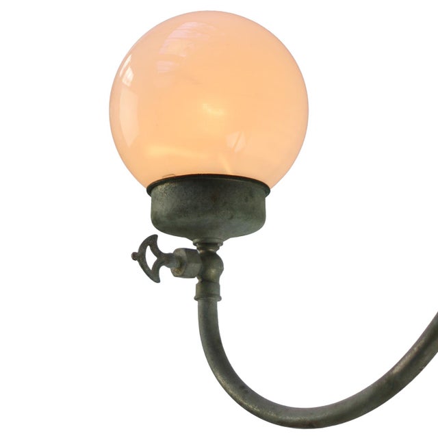 Run of large Brass Nickel Plated converted double oil lamps Exceptional colour, patina and quality Dutch store interior,...