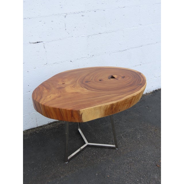 This gorgeous Side Table is made of solid wood and a chrome base. The Side Table has a gorgeous thick natural wood style,...