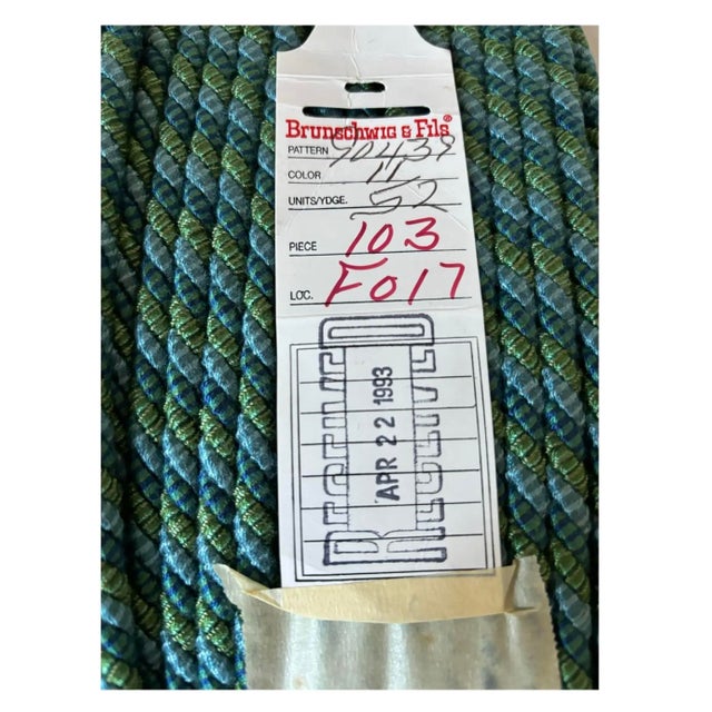 39 yards of vintage Brunschwig & Fils trim in green and blue colorway. Dated April 22, 1993.