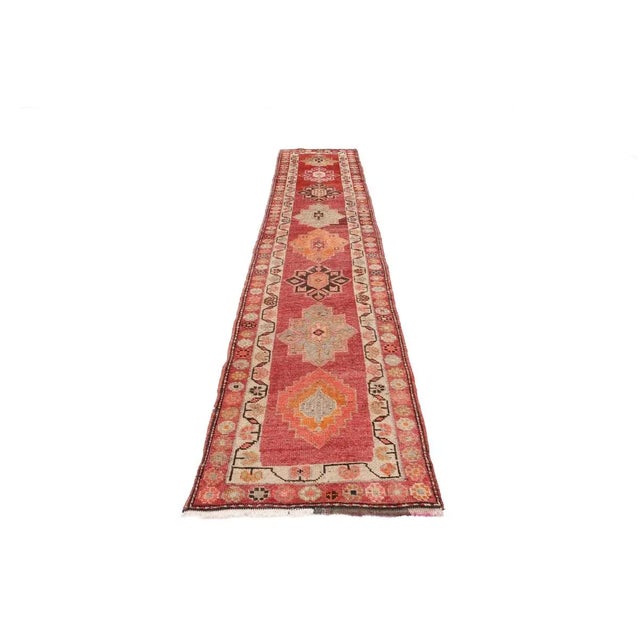 Handknotted vintage decorative Herki runner from Northern Iraq. Approximately 50-60 years old. In very good condition.