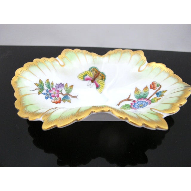 Hand painted porcelain Herend Hungary "Queen Victoria" leaf dish. Featuring scalloped edges with gold trim, soft green...