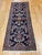 "An early 20th century Persian Lilian runner in an elegant allover floral design set in an abrash navy blue field of great...