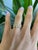 Twenty-five earth-mined diamonds sparkle across this solid 14K yellow gold band, totalling 0.35 carats. Warm and...
