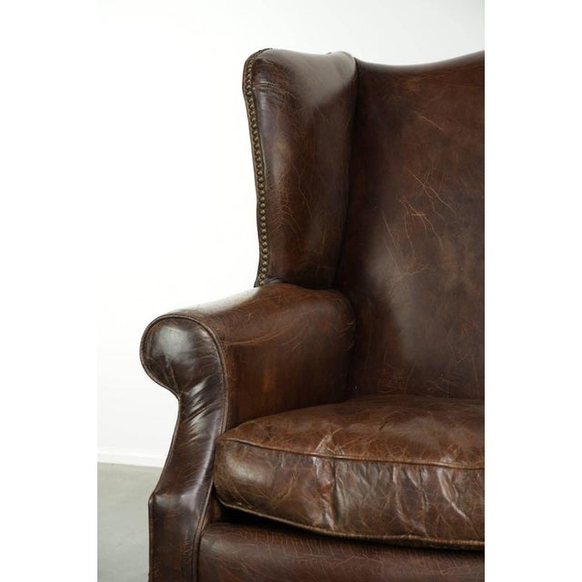 Vintage Cowhide Wing Armchair For Sale - Image 9 of 12