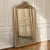 A romantic and beautifully preserved 19th century French antique giltwood mirror in the Louis XVI style, crowned by a...
