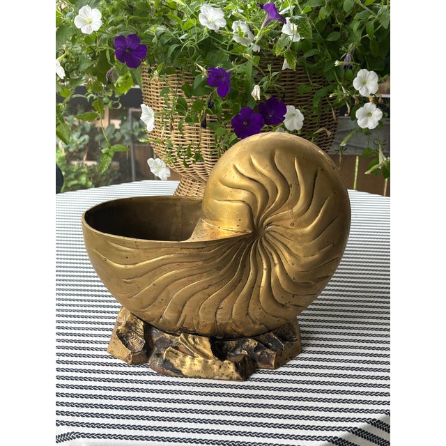 Vintage Palm Beach Style Large Brass Nautilus Shell Planter ORIGIN: Hong Kong CIRCA: Mid-20th Century MAKER'S MARK: Paper...
