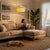 The Stretch Arc Lamp is a modern design by Kirby Groce, featuring a striking architectural silhouette that serves as a...