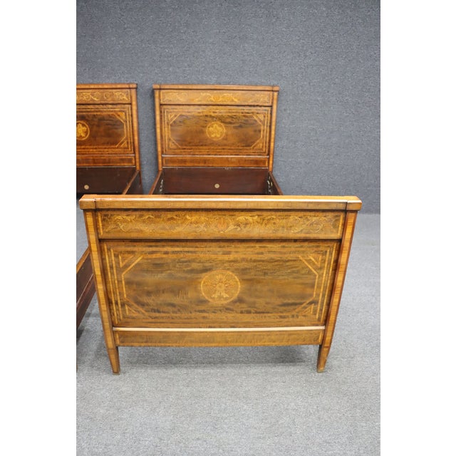 A pair of twin/single beds in Mahogajy with Satinwood inlay. *footboard 37”h