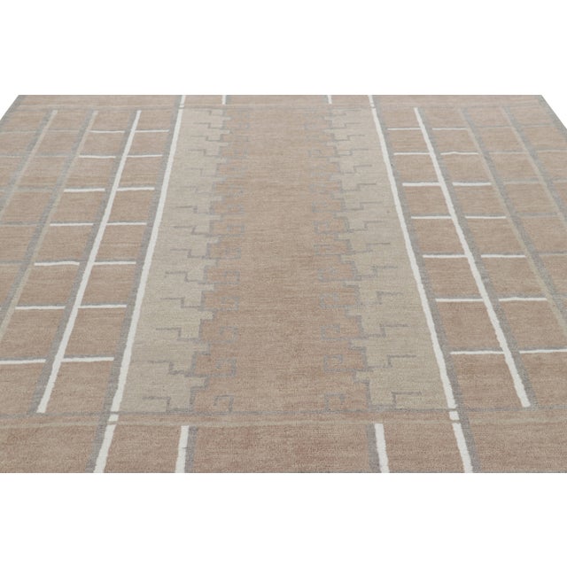 Made with hand-knotted wool and silk, this 8x10 rug is an exciting new addition to Rug & Kilim's Scandinavian rug...