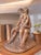 Hand-modeled embracing lovers sculpture. The romantic figures were hand-modeled in clay, then cast from plaster to create...