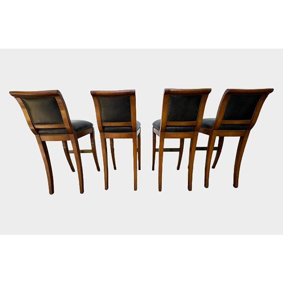 A set of classic modern bar chairs from Los Angeles designer and manufacture Nancy Corzine. These bar chairs are from the...