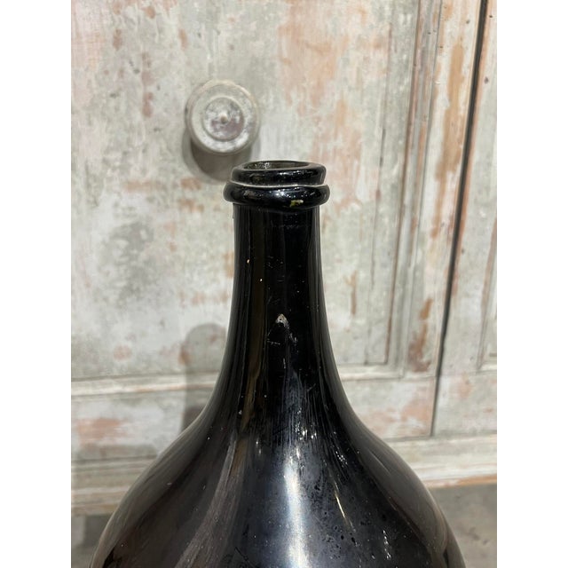 More information coming soon… Originally used to ferment wine at a vineyard in Normandy, France, this brown glass wine...
