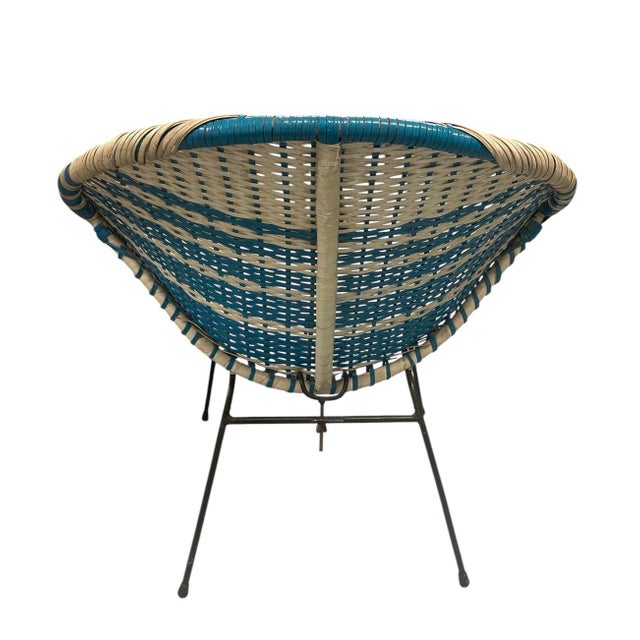 This striking armchair is a masterclass in Space Age design, blending the futuristic optimism of the 1950s and 60s with...