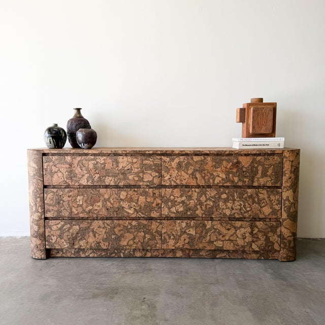 Vintage 1970s Mid-Century Modern cork dresser featuring smoothly gliding drawers and a beautifully textured cork surface...