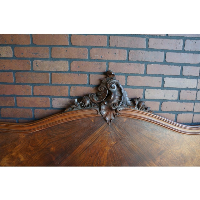 Antique French Louis XV full bed. Unique patterned veneer gives this bed a special richness. The Rococo carved center...