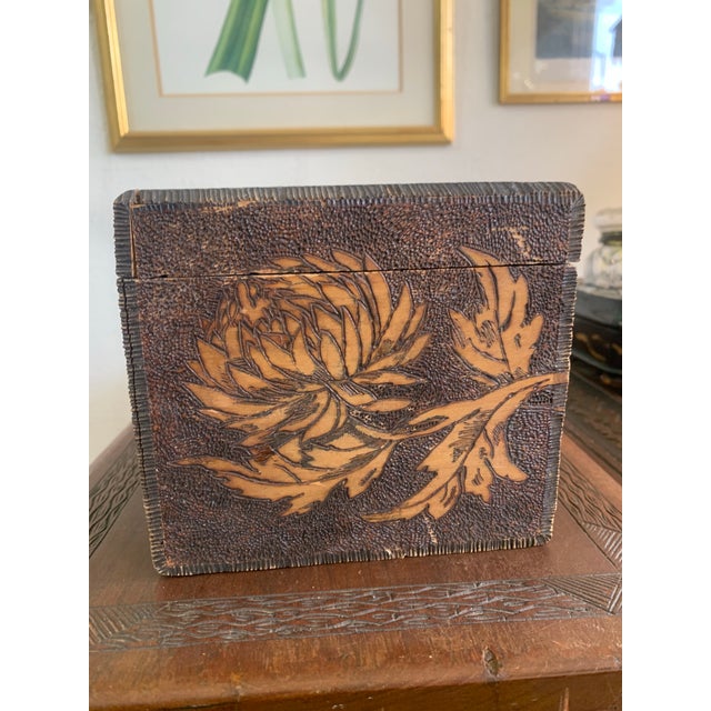 This charming antique box was manufactured by The Flemish Art Company of New York and features a beautifully executed...