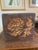 This charming antique box was manufactured by The Flemish Art Company of New York and features a beautifully executed...