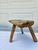A primitive three-leg milking stool with lots of character. Each leg is pinned in place by an old rusty nail. The stool...