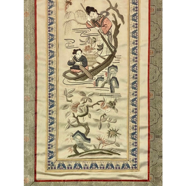 Beautifully framed in giltwood faux bamboo with red bole shining through, this vintage Chinese embroidered silk panel is a...