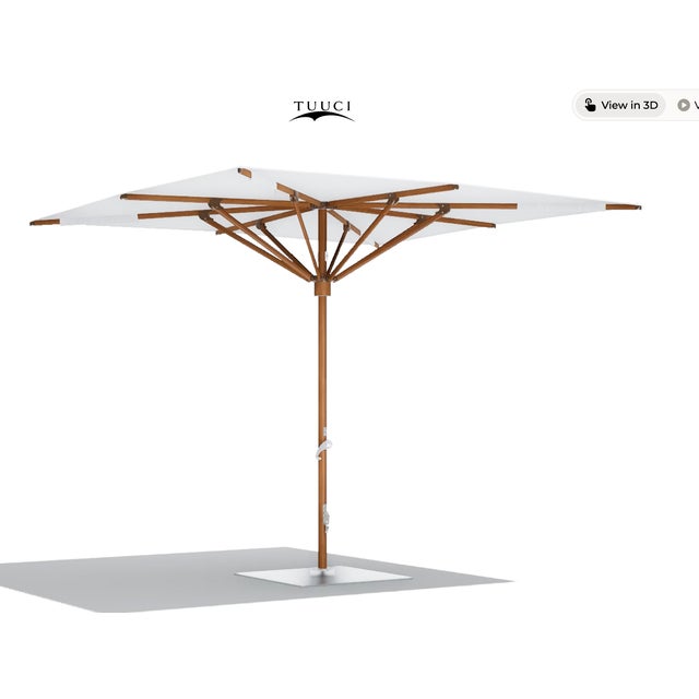 A premium outdoor market umbrella from luxury outdoor brand Tuuci— a substantial 9.5' square canopy (86.1 sq. ft. of...