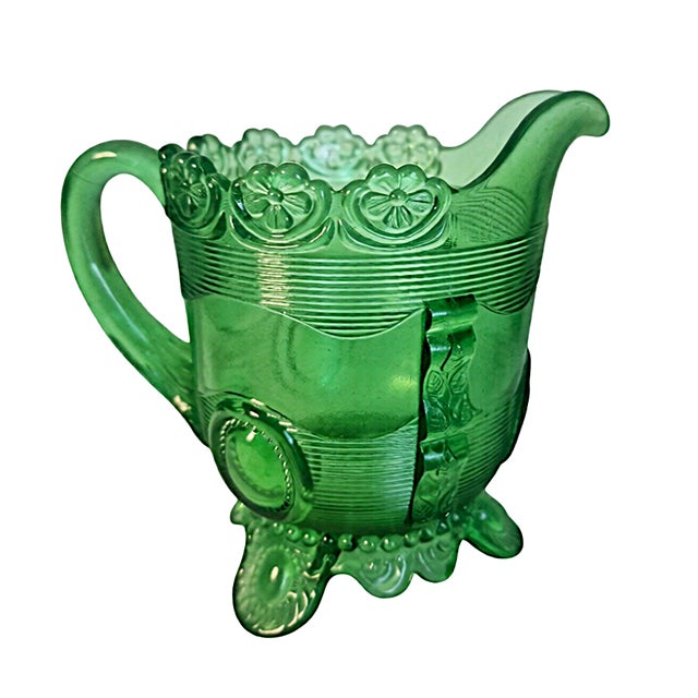 This is an antique Early American Pressed Glass (EAPG) berry set in the "Dewey" pattern (also known historically as Flower...
