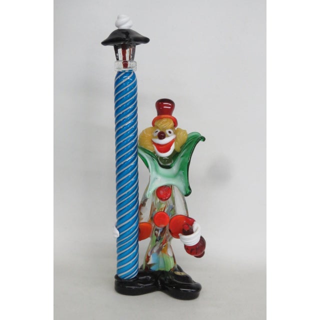 This highly charming Large Clown Figurine is made out of art glass. This adorable glass clown is posed standing by a tall...