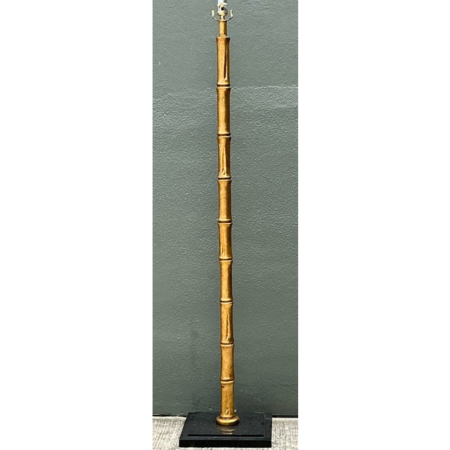 Elevate your interior with this striking Mid-Century Modern floor lamp, a masterful blend of organic influence and...