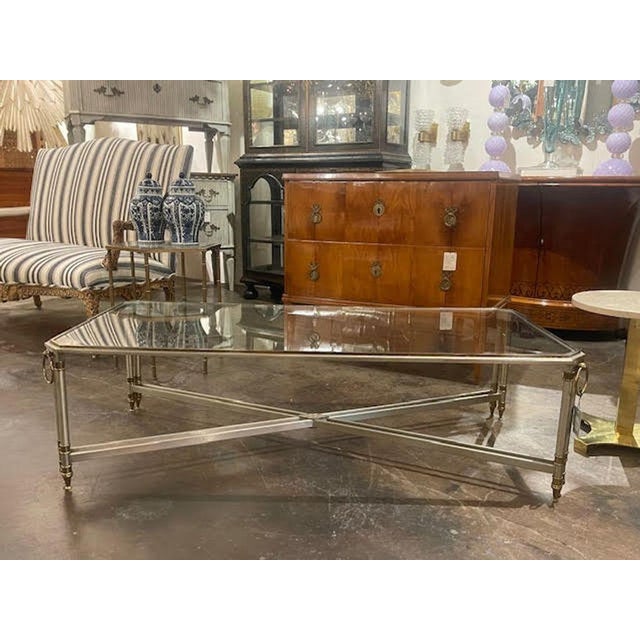 The French Jansen Manner Steel Coffee Table is an elegant piece of furniture. With its classic and sleek steel design,...