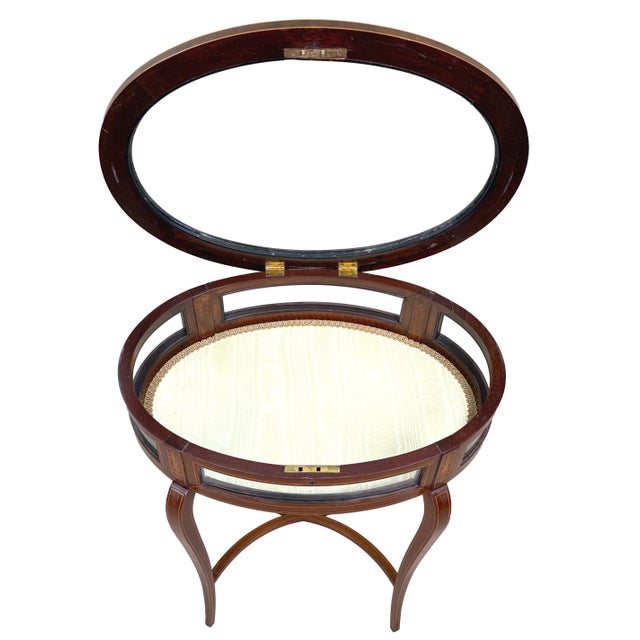 A Very Good Quality Late 19th Century Mahogany Oval Inlaid Bijouterie Type Display Table, The Hinged Top with Glass...