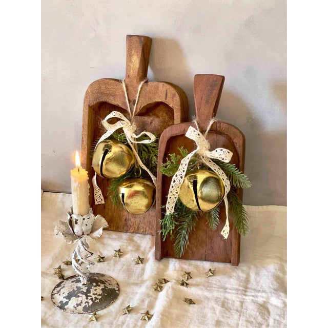 A splendid and exclusive pair of antique solid wood grain scoops, purchased at an antiques market in Holland and estimated...