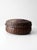 This antique Chinese lidded bamboo basket features a low, rounded form with tightly woven construction and a richly...
