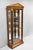Ethan Allen Medallion Collection Cherry Wood Glass Curio China Cabinet with Black Columns. Item features two side entry...