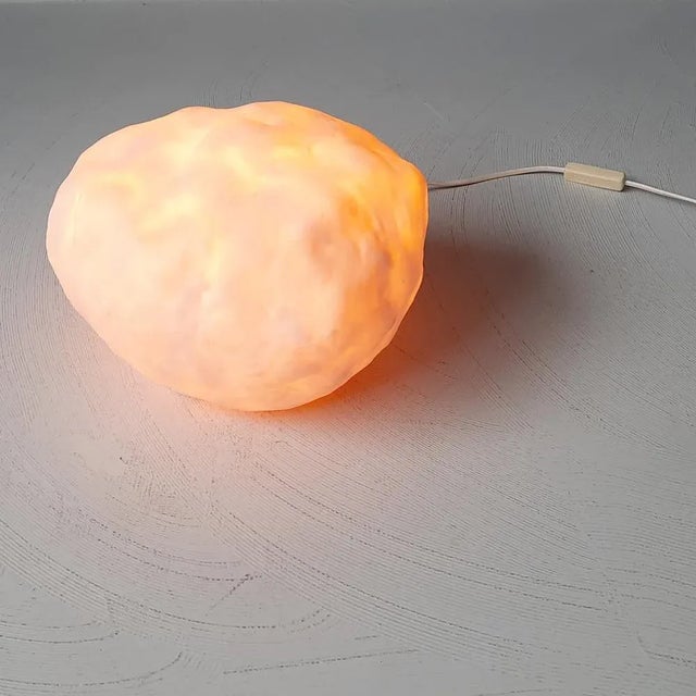 This plastic lamp looks like a big stone. It was produced in the 1980s by the German firm Heico, known for its plastic...
