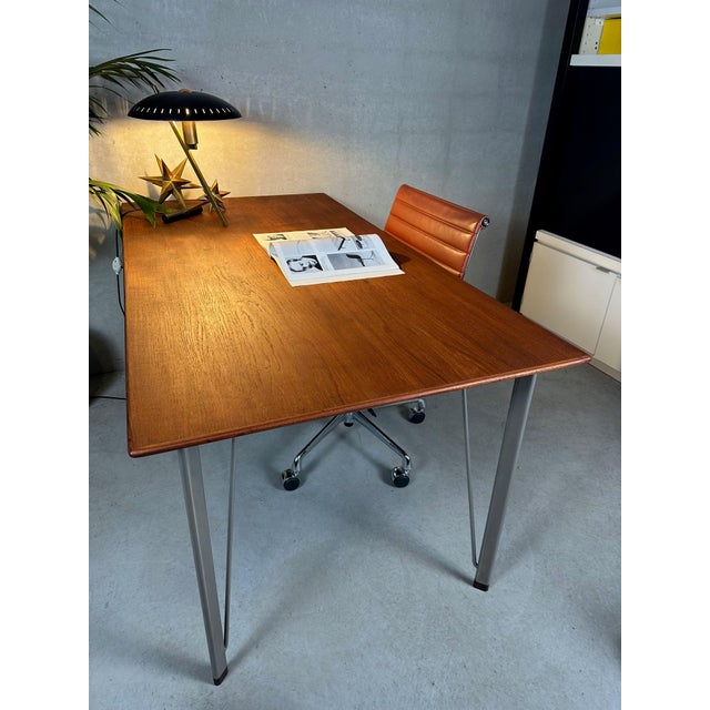 Vintage original desk model 3605, designed by Arne Jacobsen in 1955 for Fritz Hansen. Rosewood top with steel legs and...