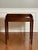 Handcrafted mahogany butler's serving tray with integrated handles on a stand, England, c. 1860. This server features a...