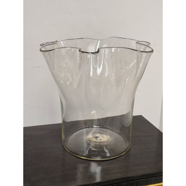 Design Plus Gallery presents a Vintage Hand-Blown Glass Vase by Jennifer Bartlett for A/D Gallery. The clear glass form...