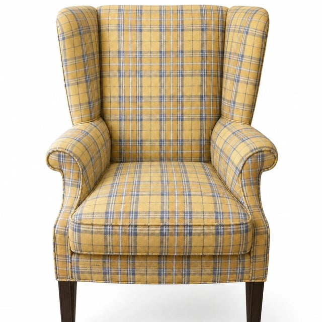 Tailored with timeless British charm, this classic wingback chair is a warm and inviting statement piece that effortlessly...