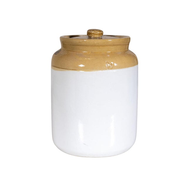 Handmade ceramic jar with lid. White and mustard glaze finish.