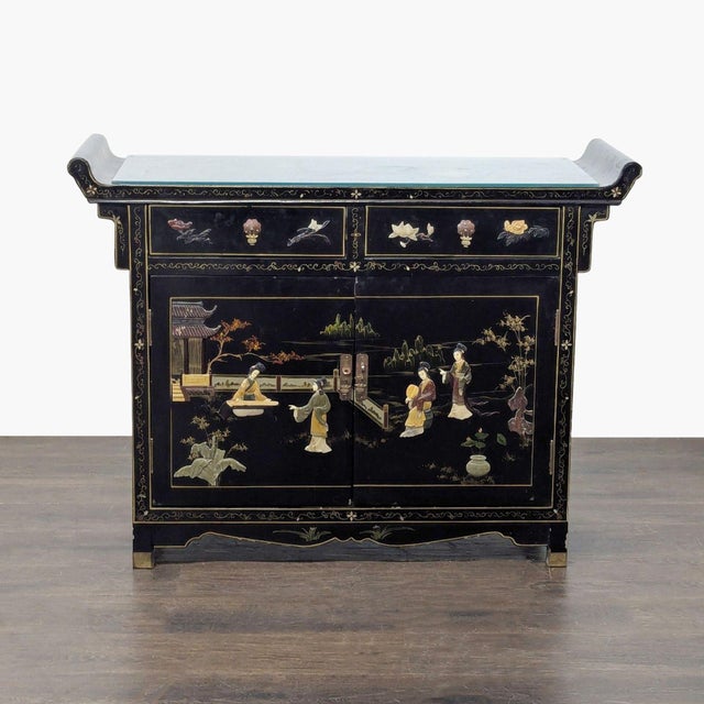Lacquer altar style cabinet, hand painted with birds and floral motifs, with raised relief figures and brass hardware....