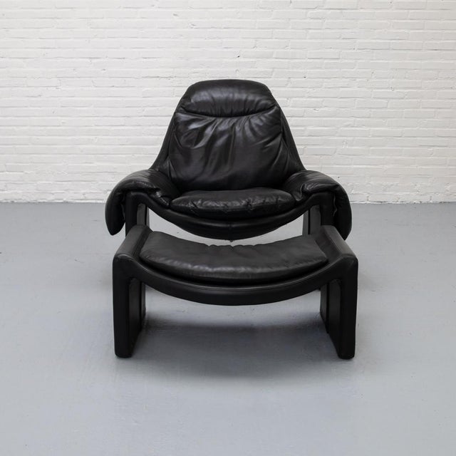 P60 armchair with matching ottoman, designed by Vittorio Introini for Saporiti Italia, circa 1970s. This comfortable...