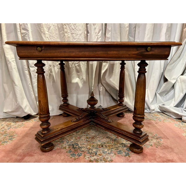 perfectly square this charming Henri II style walnut table is truly versatile... is it a center table? is it a breakfast...