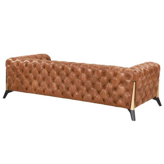 "We give you Olivia, a sophisticated contemporary spin on a classic Chesterfield design. Our signature leather with a...